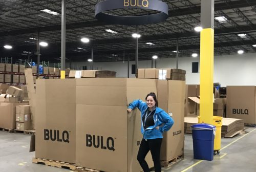 Colleen Standing Next to BULQ case