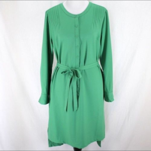 Green dress that has been properly staged to be resold 